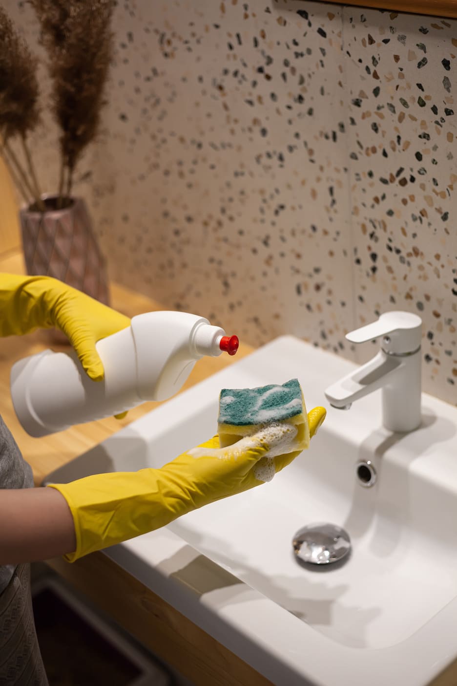 female-hands-cleaning-bathroom-washing-washbasin-protective-gloves-home